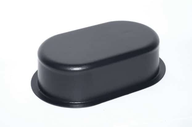 Black industrial machine guard cover for safety and protection.
