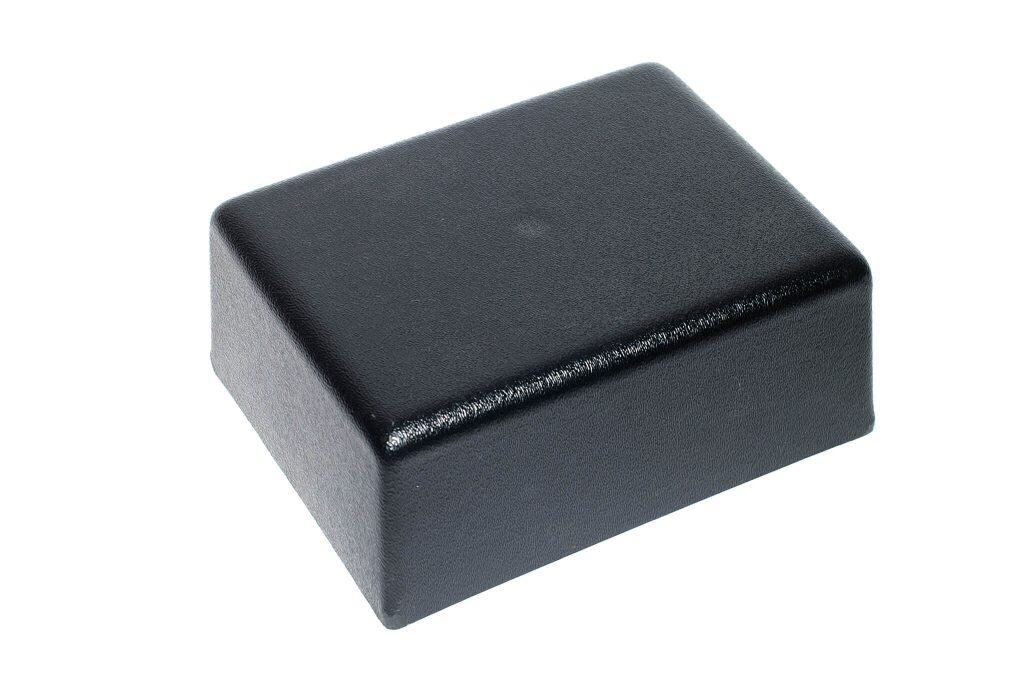 Black industrial machine guard cover for safety protection.