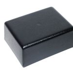 Black industrial machine guard cover for safety protection.